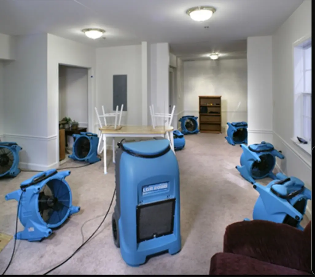 Air movers and dehumidifier setup for Water Damage Restoration in Tomah